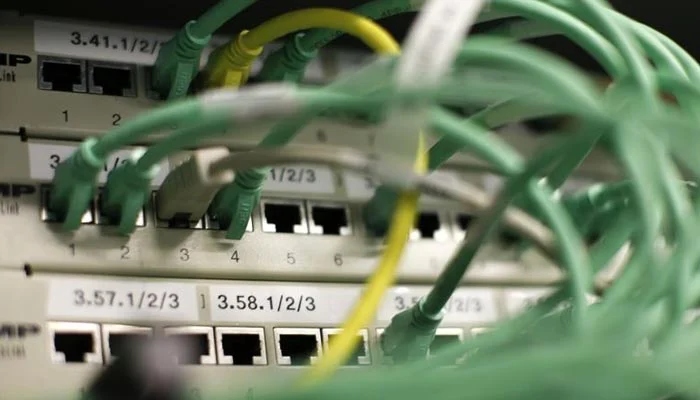 Ethernet cables used for internet connections are pictured in a Berlin offic, on August 20, 2014. — Reuters