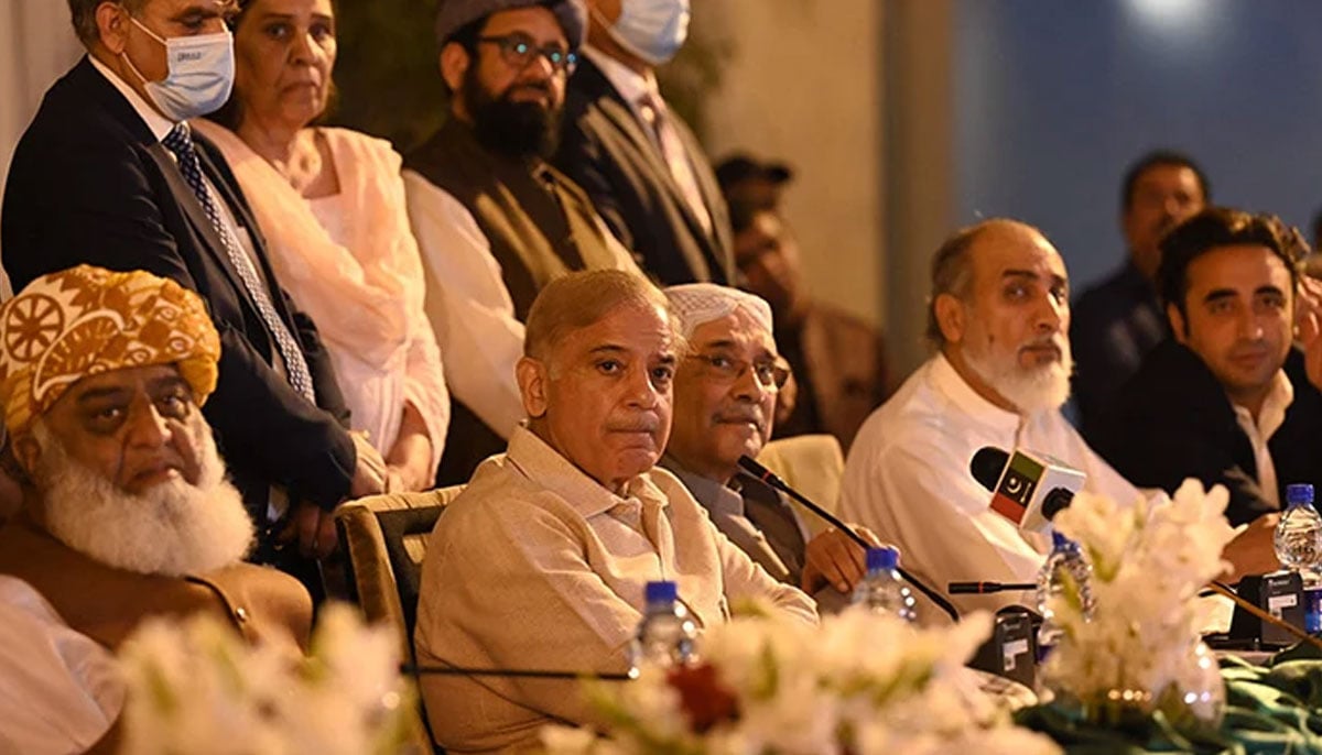 PDM leaders Shehbaz Sharif (centre), Asif Ali Zardari (right) and Fazlur Rehman (left) speak during a press conference in Islamabad, on March 28, 2022. — AFP