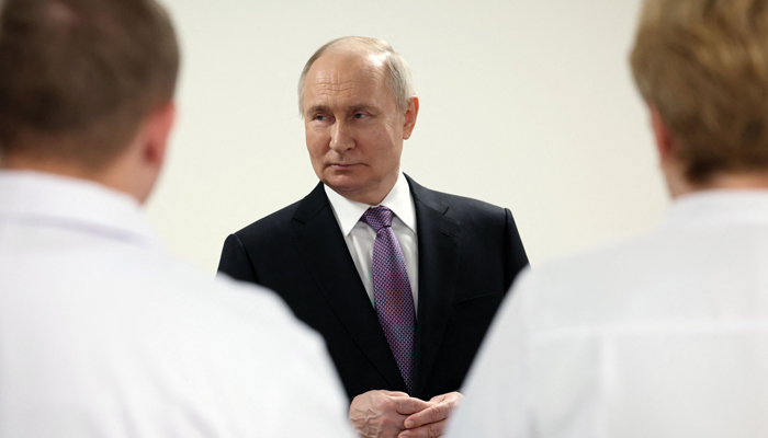 This photograph shows Russias President Vladimir Putin visiting a cancer clinic in Tula on February 2, 2024. — AFP