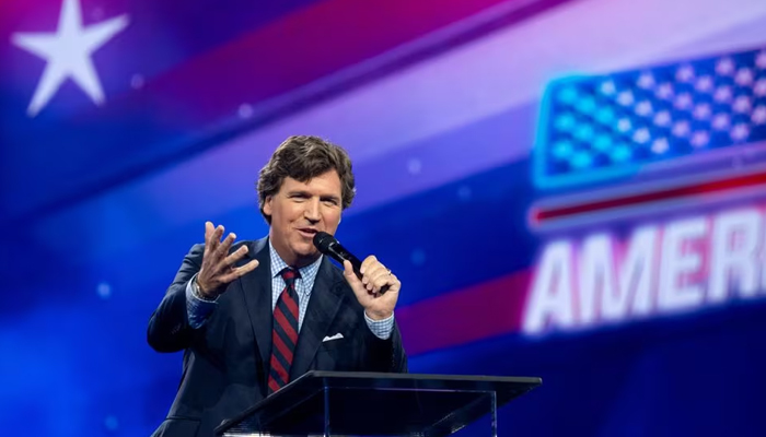 Tucker Carlson speaks as conservative leaders and personalities attend Turning Point USAs AmericaFest 2023 in Phoenix, Arizona, US December 18, 2023. — Reuters