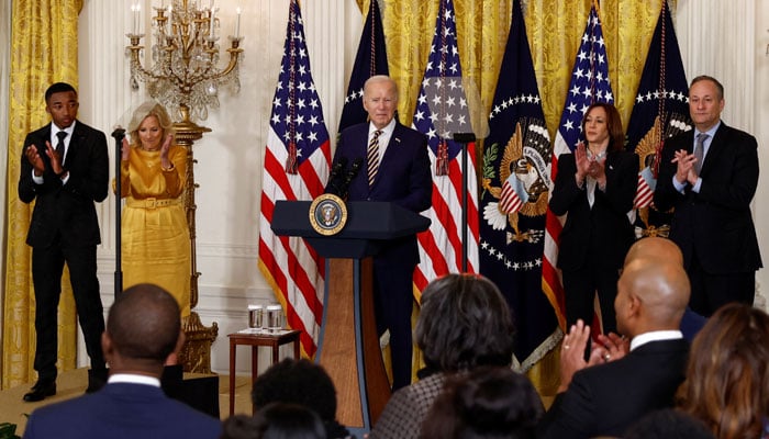 US President Joe Biden delivers remarks accompanied on stage by first lady Jill Biden (left), Entrepreneur and Digital Creator Nijel B Murray (far left), US Vice President Kamala Harris (right) and second gentleman Doug Emhoff during an event at the White House in recognition of Black History Month, in Washington, US, February 6, 2024. — Reuters