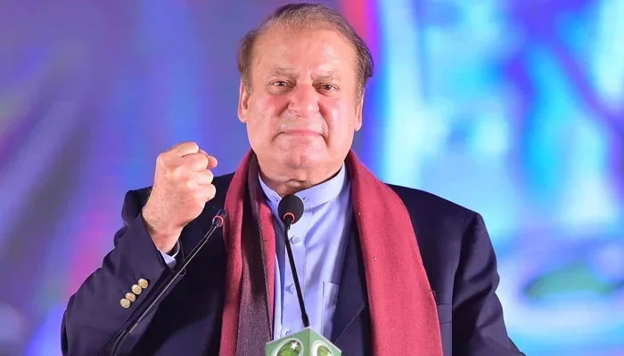 PMLN supremo and former Prime Minister Mian Nawaz Sharif makes a fist during a massive power show in Lahore after returning to Pakistan on October 21, 2023. — Facebook/PMLN/Facebook/Pakistan Peoples Party - PPP