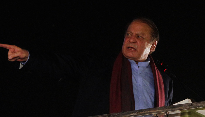 Former PM Nawaz Sharif addresses supporters upon his arrival from a self-imposed exile in London in Lahore, October 21, 2023. — Reuters
