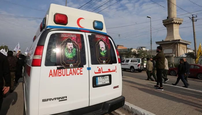 Ambulances carry the coffins of Iraqi Shiite armed group members who were killed by a US air strike in al-Qaim, during a funeral in Baghdad, Iraq February 4, 2024. — Reuters