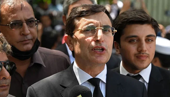 Barrister Gohar Ali Khan (centre), the leading lawyer of the legal team of imprisoned PTI founder Imran Khan, is speaking with the media. – AFP/File
