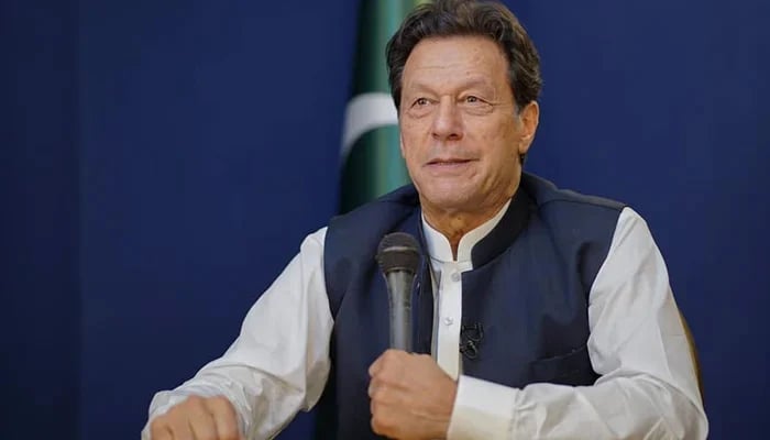 Pakistan Tehreek-e-Insaf (PTI) founding chairman Imran Khan smiles as he addresses virtually on April 25, 2023. — Facebook/Imran Khan