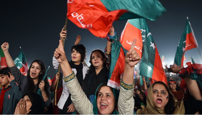 PTI activists seen enjoying during the thanksgiving rally in the federal capital in November 2016. —AFP