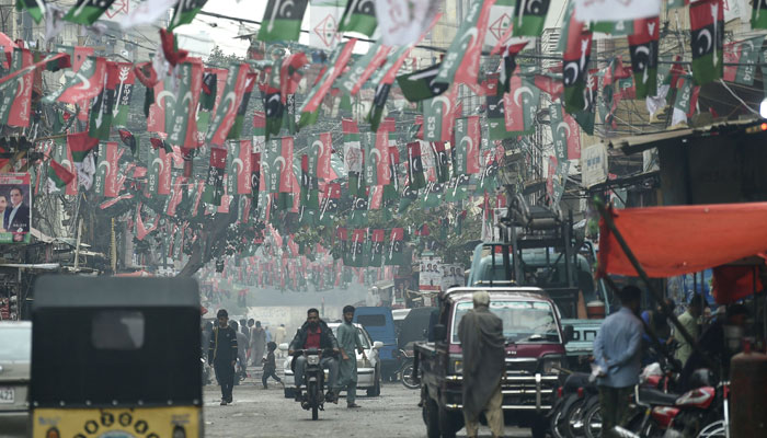 Supporters of Muttahida Qaumi Movement-Pakistan (MQM-P) attend an election campaign rally in Karachi on January 21, 2024. — AFP