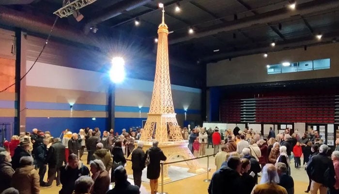 Model enthusiast Richard Plauds 7.19 metre Eiffel Tower made of matchsticks displayed in Saujon, France. — Reuters/File