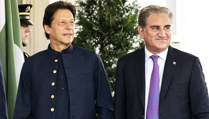 PTI founder Imran Khan and the partys senior leader Shah Mahmood Qureshi. — PTI
