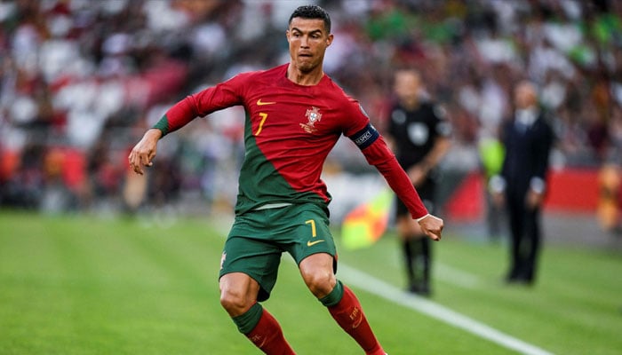 Cristiano Ronaldo runs with the ball during the UEFA Euro 2024 group J qualification football match between Portugal and Bosnia-Herzegovina at the Luz stadium, Lisbon, Portugal, June 17, 2023. — AFP