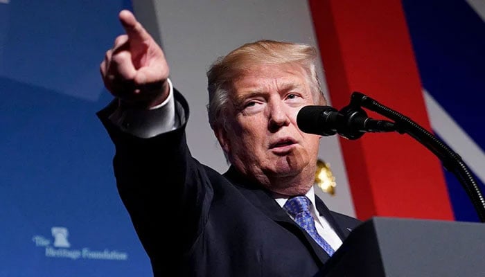 Donald Trump gestures while speaking at a political gathering. — AFP/File