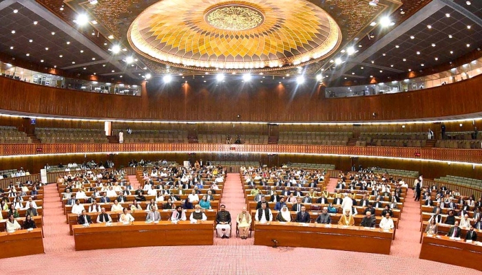 A view of the National Assembly with Speaker NA Raja Pervez Ashraf in a group photo with the participants of the International Constitutional Convention to Commemorate the Golden Jubilee of Constitution ofPakistan at the Parliament House in Islamabad on May 10, 2023. —APP