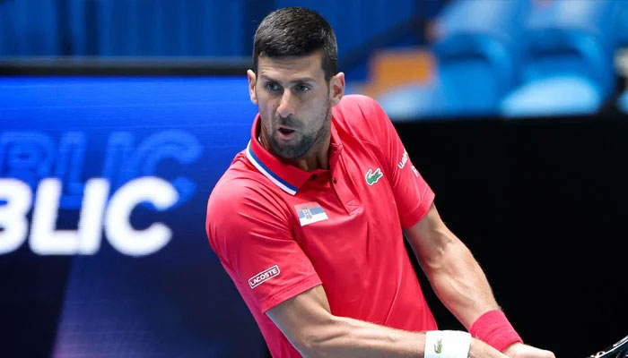 Novak Djokovic plays a backhand shot. — AFP/File