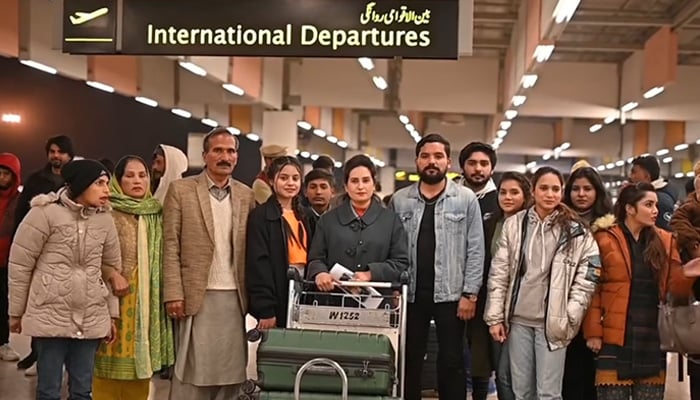 Group photo of Pakistani professionals ready to depart abroad for international careers in this undated video still.  — Facebook/JawadSohrabMalik
