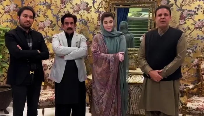 PTI-backed independent candidate Waseem Qadir (right) with PML-N leaders in Lahore, on February 11, 2024, in this still taken from a video. — PML-N