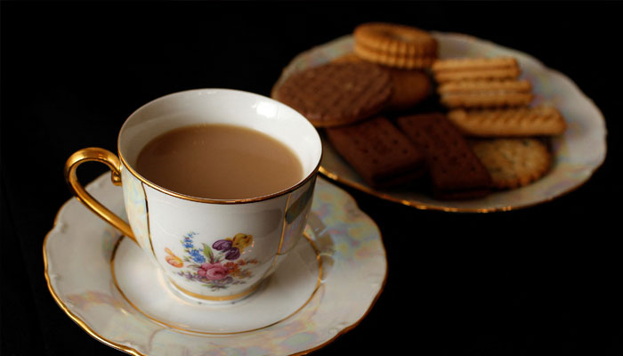 A cup of tea and plate of biscuits are photographed in London June 6, 2012. —Reuters