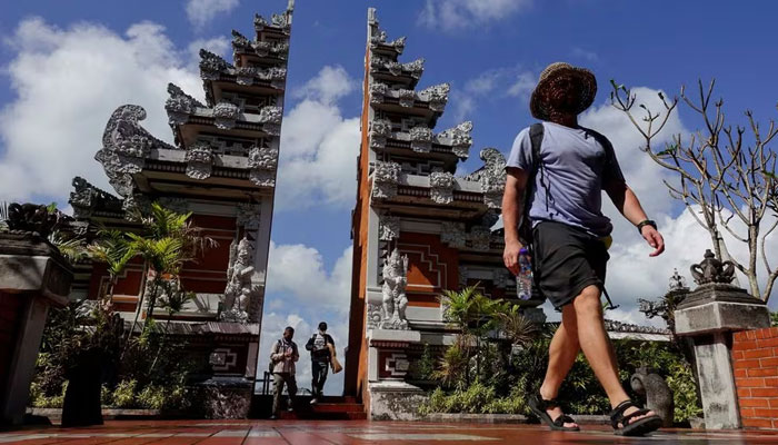 Passengers arrive at the I Gusti Ngurah Rai International Airport in Badung, Bali, Indonesia, September 2, 2022. — REUTERS