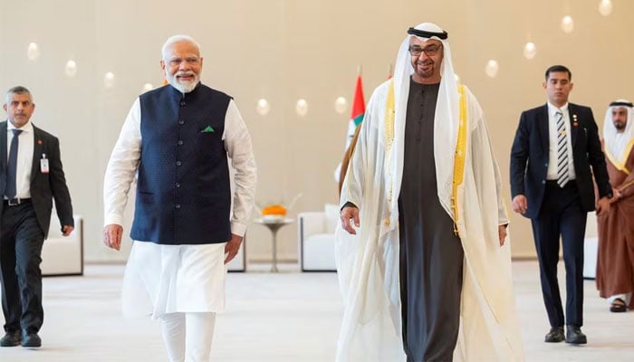 President of the United Arab Emirates Sheikh Mohamed bin Zayed Al Nahyan (right) walks with Prime Minister of India Narendra Modi during a reception at the Presidential Airport, in Abu Dhabi, UAE, February 13, 2024. — Reuters