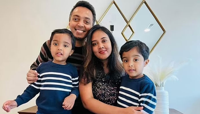 Image shows Anand Sujith Henry with his wife Alice Benziger and twin boys. — Facebook/Anand Henry
