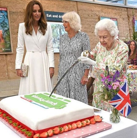 Video: On the attack Queen Camilla copies late Queen Elizabeths sword act?