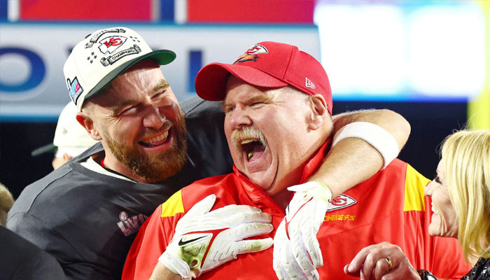 Feb 12, 2023; Glendale, Arizona, US; Kansas City Chiefs tight end Travis Kelce (87) celebrates with head coach Andy Reid after winning Super Bowl LVII against the Philadelphia Eagles at State Farm Stadium.—Reuters
