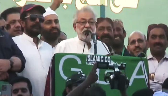 PML-F chief and GDA head Sibghatullah Shah Rashdi, alias Pir Pagara addresses the protest against alleged election rigging in Jamshoro, Sindh, on February 16, 2024, in this photo taken from a video. — Geo News