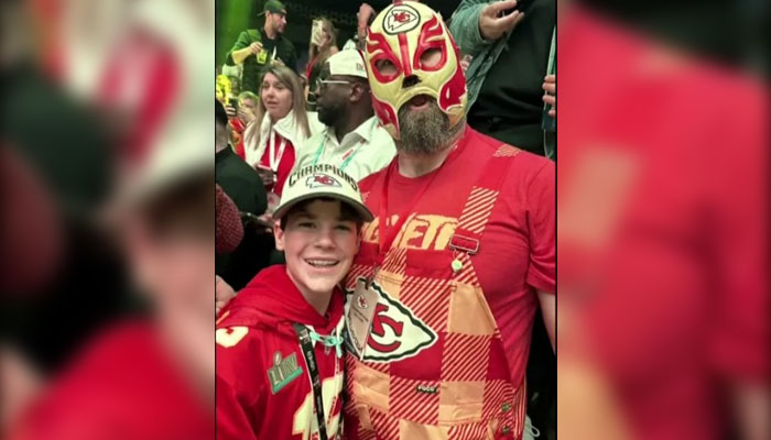 Kansas City Chiefs fan Elijah Smith (left) poses with Philadelphia Eagles centre Jason Kelce at the Super Bowl afterparty in Las Vegas. — NBC News