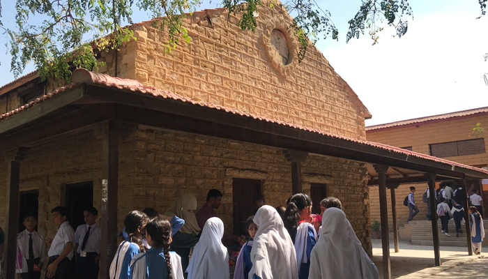 Students gather outside for a break during the competition.  — Photo by author