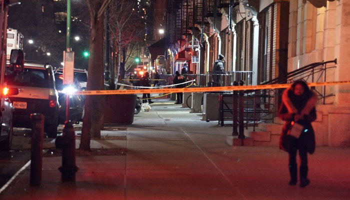 Emergency personnel respond at the scene where NYPD officers were shot while responding to a domestic violence call in the Harlem neighborhood of New York City, US. — Reuters/File
