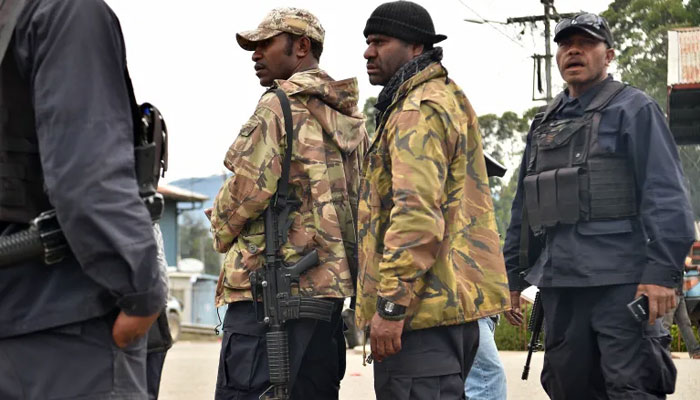 Police preparing to go on patrol outside their police station in the town of Wabag in the highlands province of Enga, November 21, 2018. — AFP