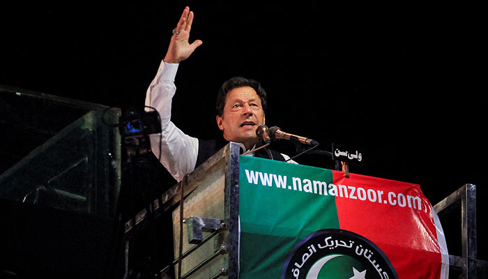 Ousted prime minister Imran Khan gestures as he addresses supporters during a rally, in Lahore, Pakistan April 21, 2022. — Reuters