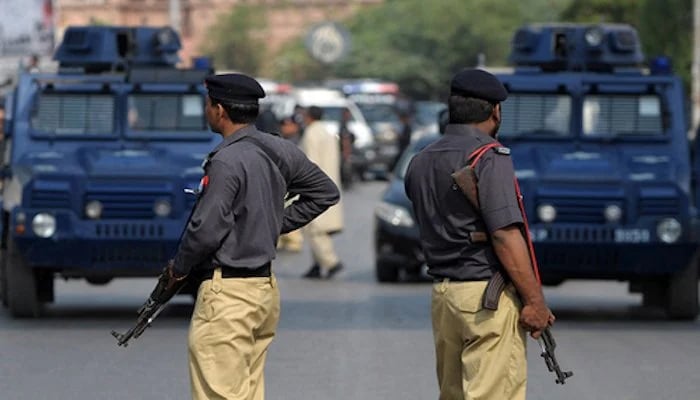 Policemen in Karachi can be seen standing guard in this undated image. — AFP/File