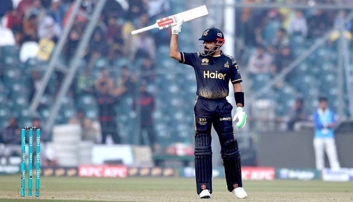 Peshawar Zalmi batter Babar Azam waving bat after scoring 50 during the Pakistan Super League (PSL) Twenty20 cricket match played against Quetta Gladiators at the Gaddafi Cricket Stadium on February 18. —APP