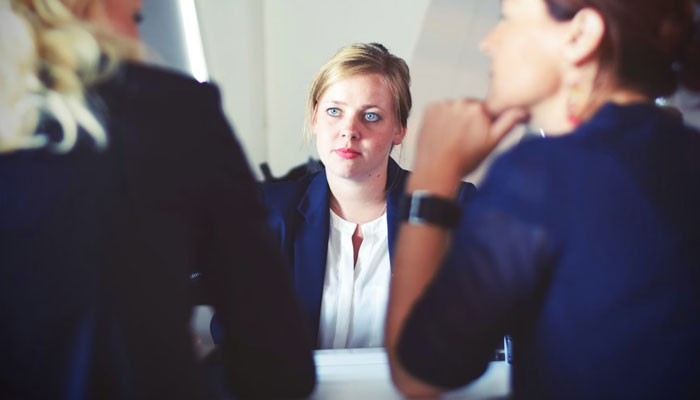 A representational image of a job interview. — Unsplash