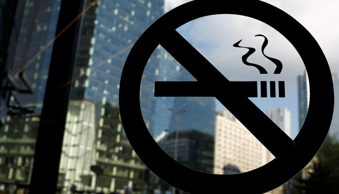 A no smoking sign is placed on the office building window in the centre of Warsaw, Poland May 12, 2017. — Reuters