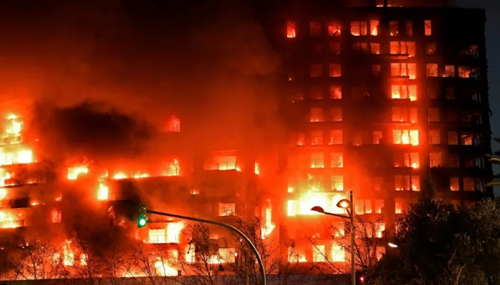 The fire erupted in a 14-storey building in Spains eastern port city of Valencia, Spain. — AFP