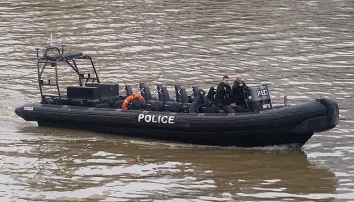 Members of the Metropolitan Police Marine Policing Unit searched for the body. — Metropolitan Police