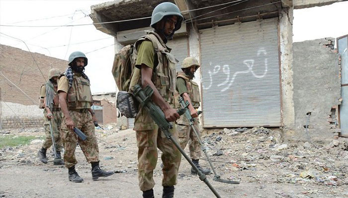 Pakistani soldiers stand guard in Bannu, Khyber-Pakhtunkhwa July 2, 2014. — Reuters