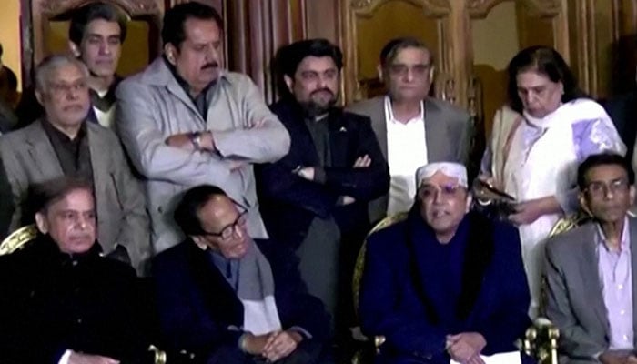 (From left to right, front row) PML-N President Shehbaz Sharif, PML-Q Chief Chaudhry Shujaat Hussain and PPP Co-Chairman Asif Ali Zardari addressing the joint press conference in Lahore on February 13, 2024. — GeoNews