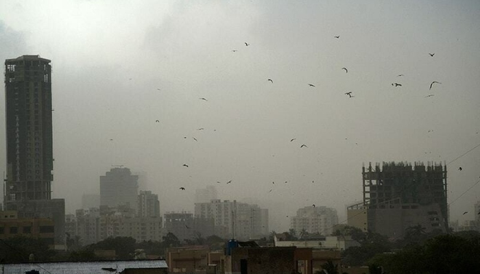 A general view shows the port city, Karachi, on May 18, 2021 during a sand storm. —AFP