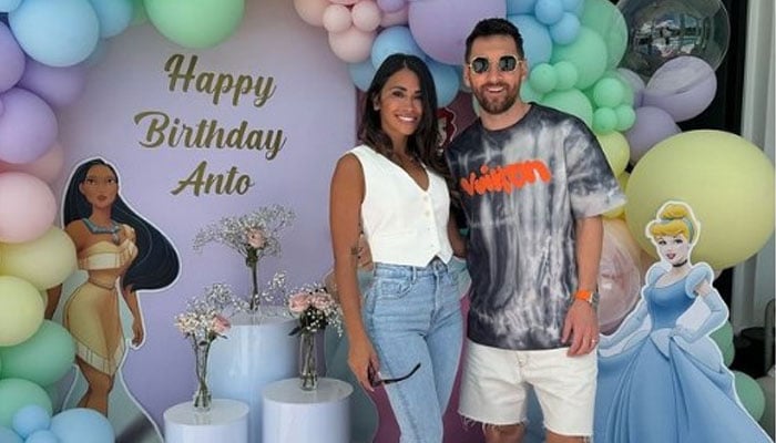 Inter Miamis Lionel Messi (right ) poses with his wife Antonela Roccuzzo at her Disney-themed birthday party. — Instagram/@leomessi