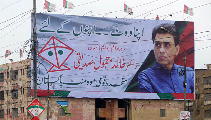 A banner put up in a building in Karachi with the MQM-P Convener Khalid Maqbool Siddquis face on it. — Online/File