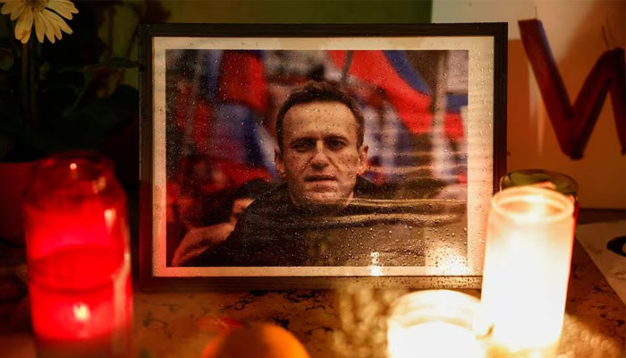 Candles burn as people attend a vigil following the death of Russian opposition leader Alexei Navalny, at the Trocadero near the Eiffel Tower in Paris, France, February 19, 2024. — Reuters