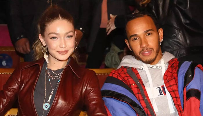 Gigi Hadid and Lewis Hamilton attend the Tommy Hilfiger TOMMYNOW Spring 2019 : TommyXZendaya Premieres on March 02, 2019 in Paris, France. —Wireimage
