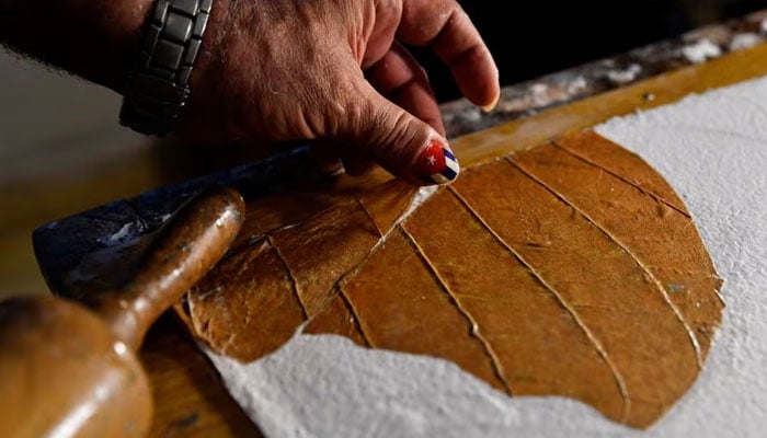 Artist Milton Bernal works in his studio in Havana, Cuba, February 24, 2024. —Reuters