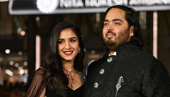 Radhika Merchant with fiance Anant Ambani. — AFP/File