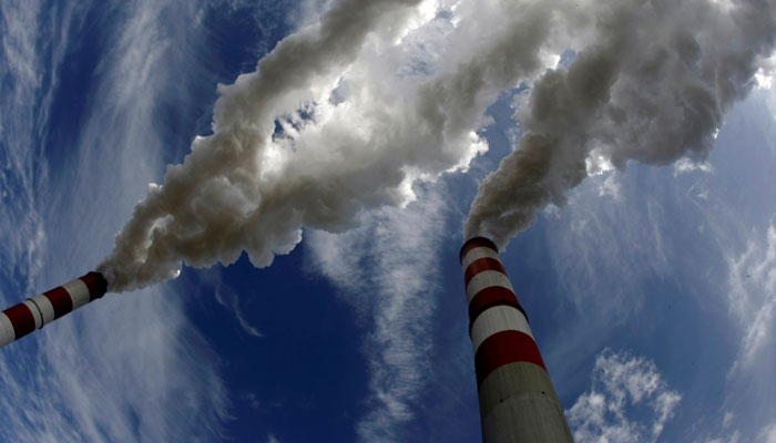 Smoke billows from the chimneys of Belchatow Power Station, Europes biggest coal-fired power plant, in this May 7, 2009. — Reuters