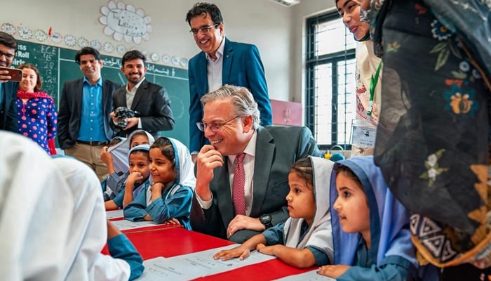 US Ambassador Donald Blome (centre) interacts with school children. — Supplied