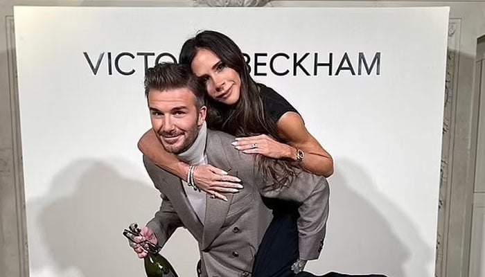 David Beckham carries Victoria Beckham at the Paris Fashion Week. — Instagram/@victoriabeckham